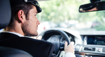 man driving a car